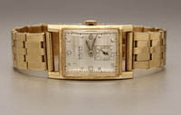 Appraisal: A gold wristwatch Gruen Curvex A gold wristwatch Gruen Curvex