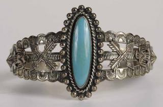 Appraisal: Silver Turquoise Southwestern Bracelet cuff bracelet decorated with pattern of