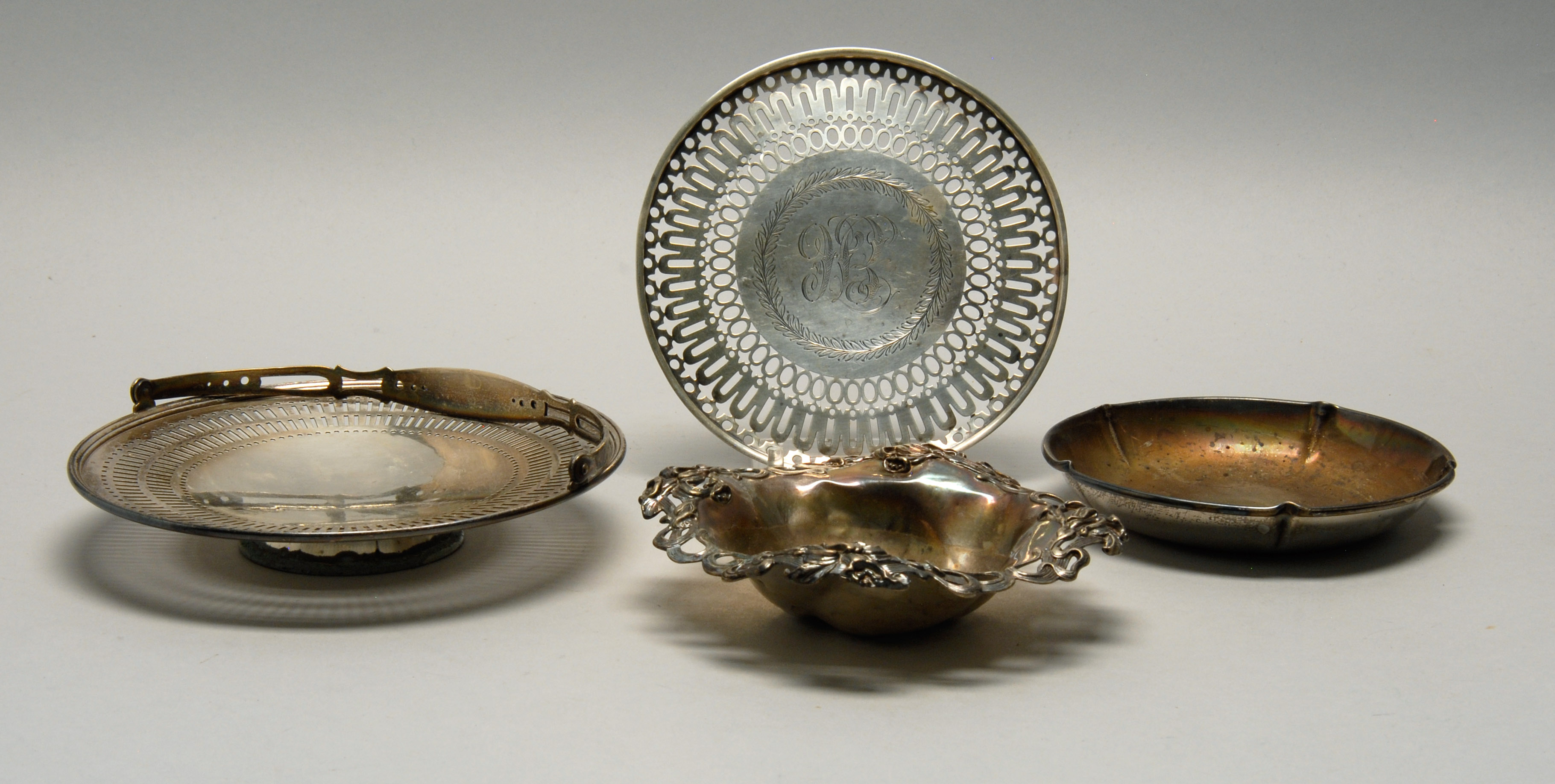 Appraisal: FOUR PIECES OF AMERICAN STERLING SILVER HOLLOWWARE Gorham monogrammed footed