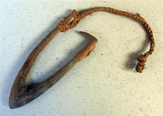 Appraisal: Polynesian possibly Maori carved wooden fishhook the barb lashed with