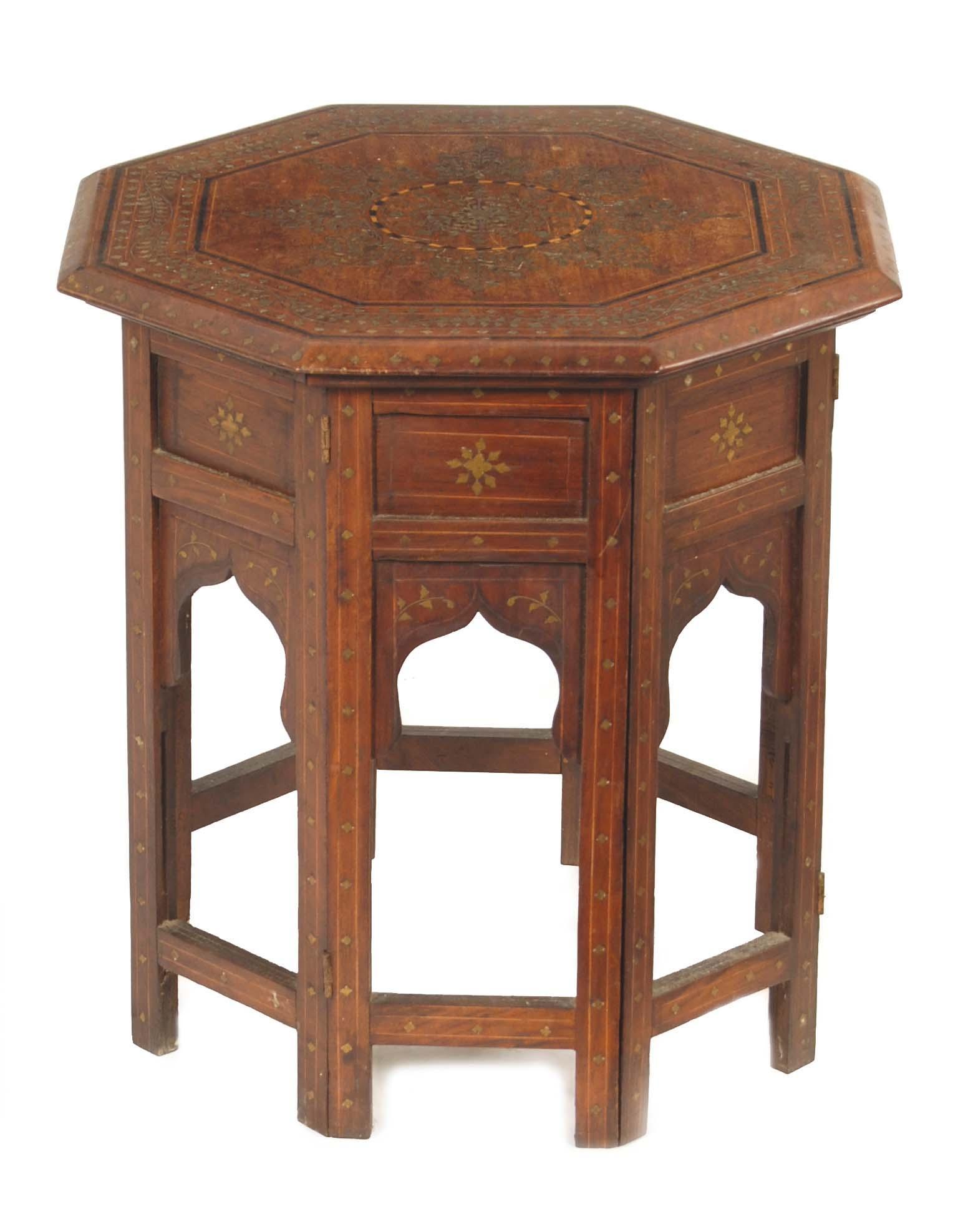 Appraisal: An Indian hardwood brass inlaid and strung octagonal low table