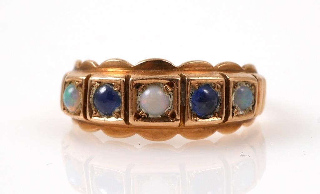 Appraisal: Vintage k yellow gold band with opal and sapphire cabochons