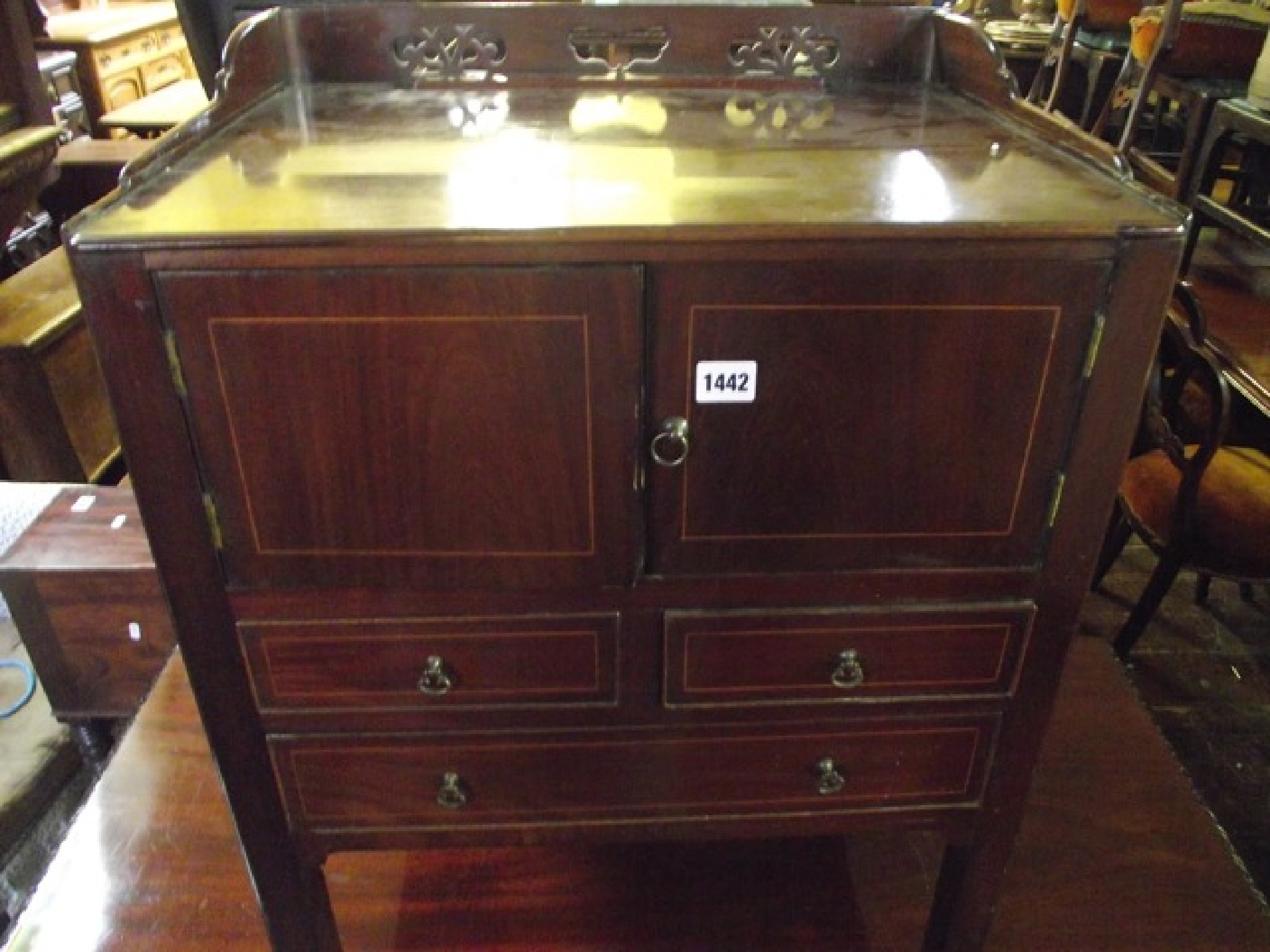 Appraisal: A Georgian mahogany night commode with three-quarter gallery enclosed mirror