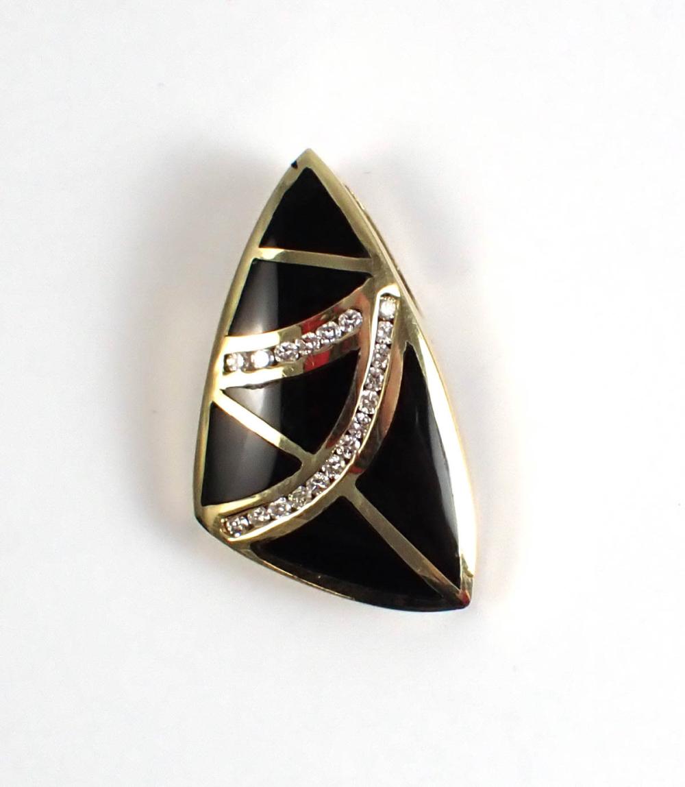 Appraisal: BLACK ONYX DIAMOND AND FOURTEEN KARAT GOLD SLIDE PENDANT with