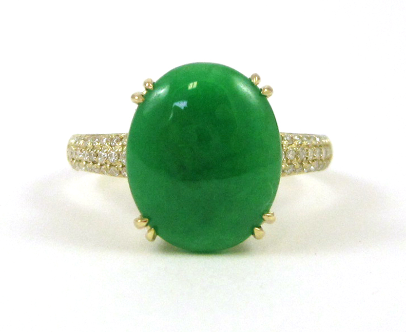 Appraisal: JADE DIAMOND AND FOURTEEN KARAT GOLD RING with three rows