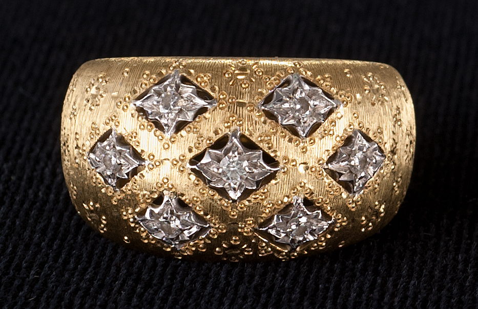 Appraisal: KT YELLOW GOLD AND DIAMOND RING In dome style with