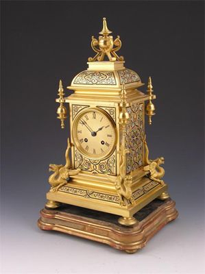 Appraisal: A French gilt brass and enamel mantel clock striking movement