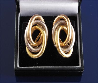 Appraisal: A pair of three colour gold hoop earrings g