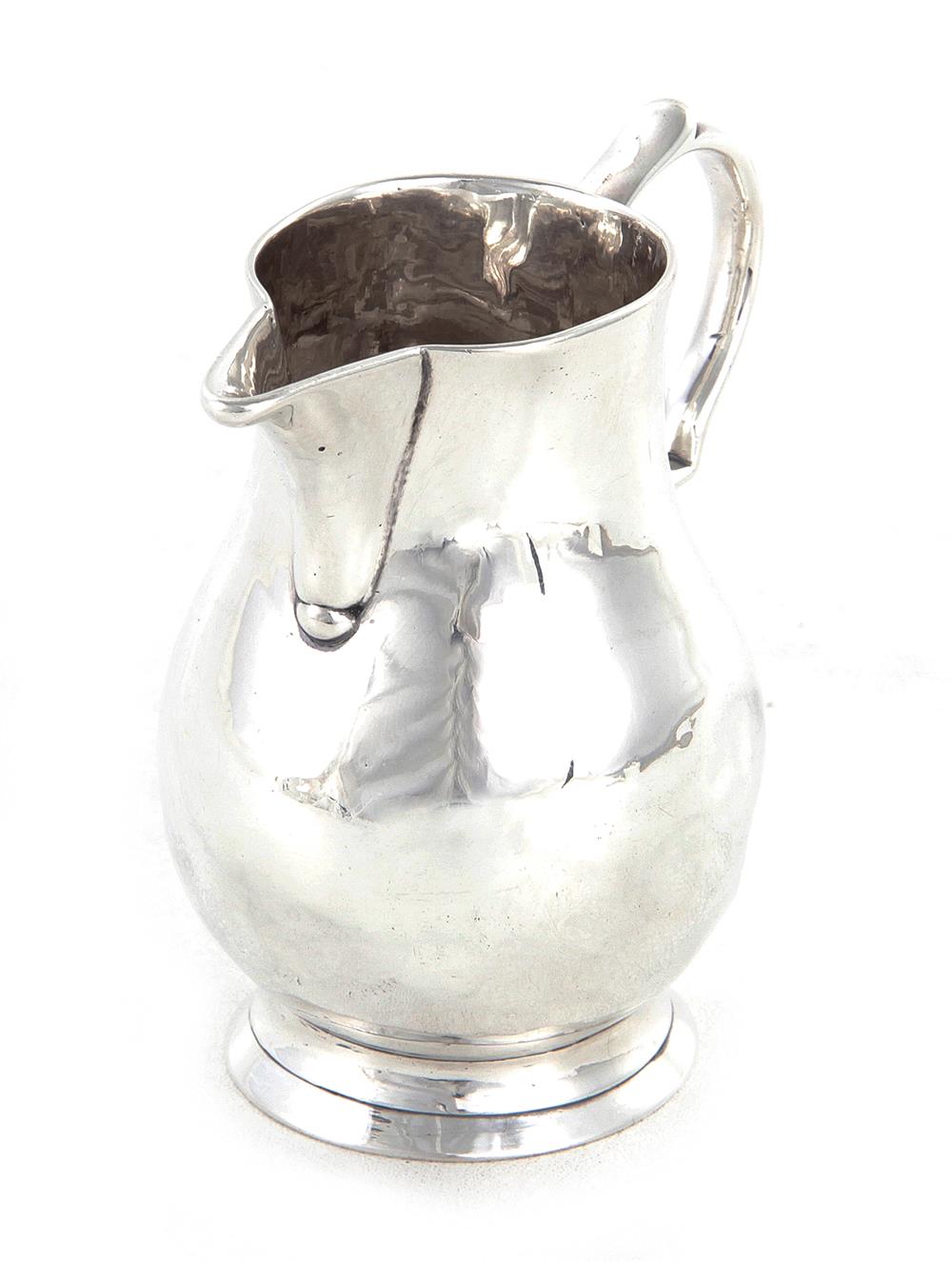 Appraisal: George I sterling creamer London dated baluster form sparrow's-beak spout