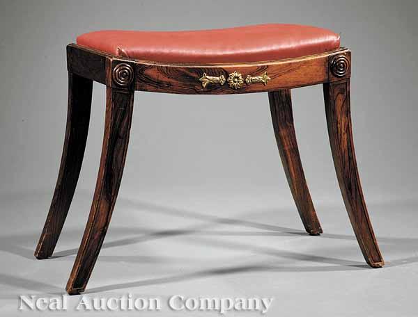 Appraisal: A Regency Rosewood Bench early th c saddle slip seat