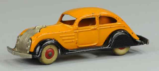 Appraisal: DENT CHRYSLER AIRFLOW Cast iron orange body and black chassis