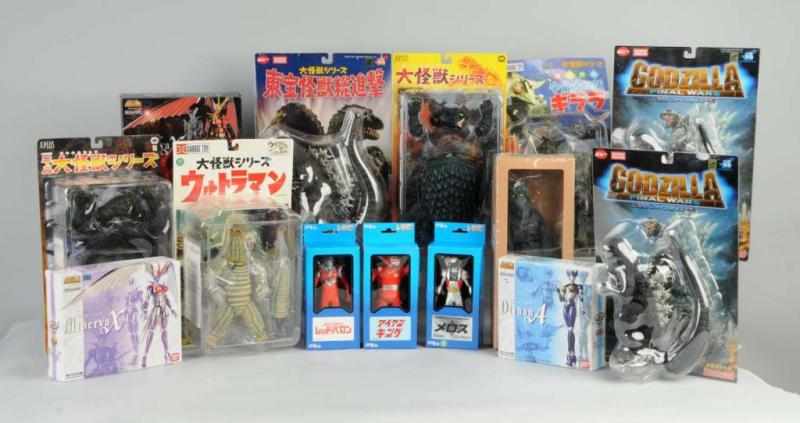 Appraisal: Lot of Boxed Godzilla Ultraman Action Figures Description Fifteen plus