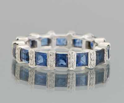 Appraisal: A Ladies' Platinum Sapphire and Diamond Eternity Band Platinum eternity