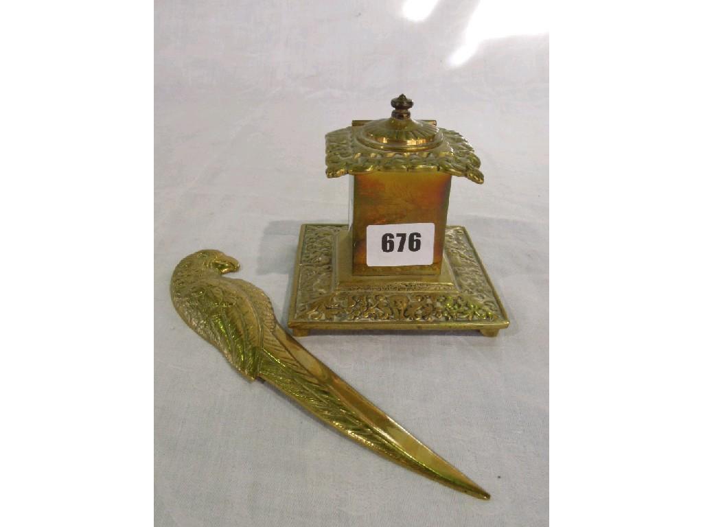 Appraisal: A brass rectangular shaped inkwell with circular finial lid raised