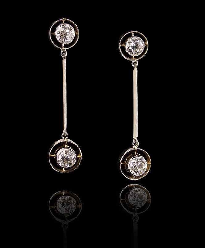 Appraisal: ART DECO GOLD PLATINUM DIAMOND DROP EARRINGS Four solitaire old