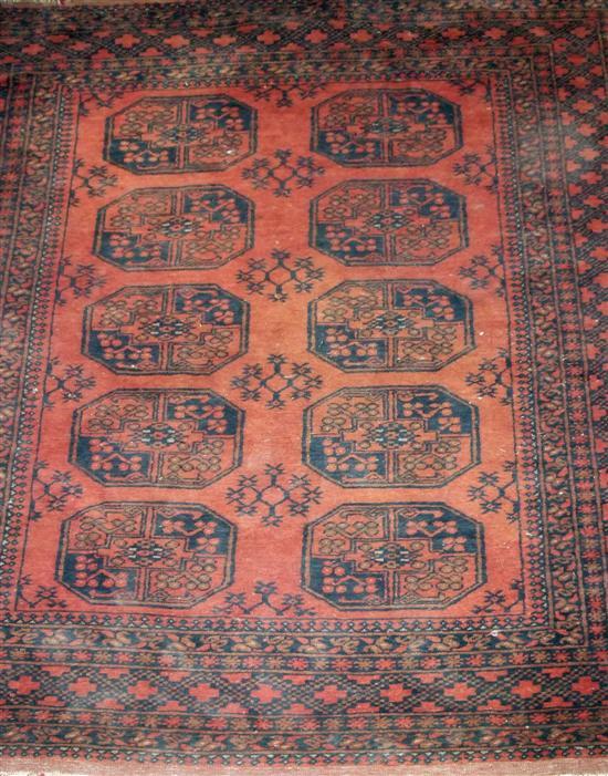 Appraisal: Red ground persian rug with repeating shaped medallions w d