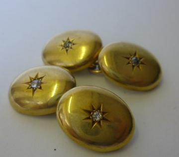 Appraisal: A PAIR OF CT GOLD CUFFLINKS of plain oval form