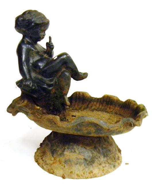 Appraisal: th C cast-iron black painted garden ornament figural birdbath on