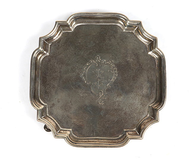 Appraisal: A GEORGE II SILVER CARD TRAY square shaped with canted