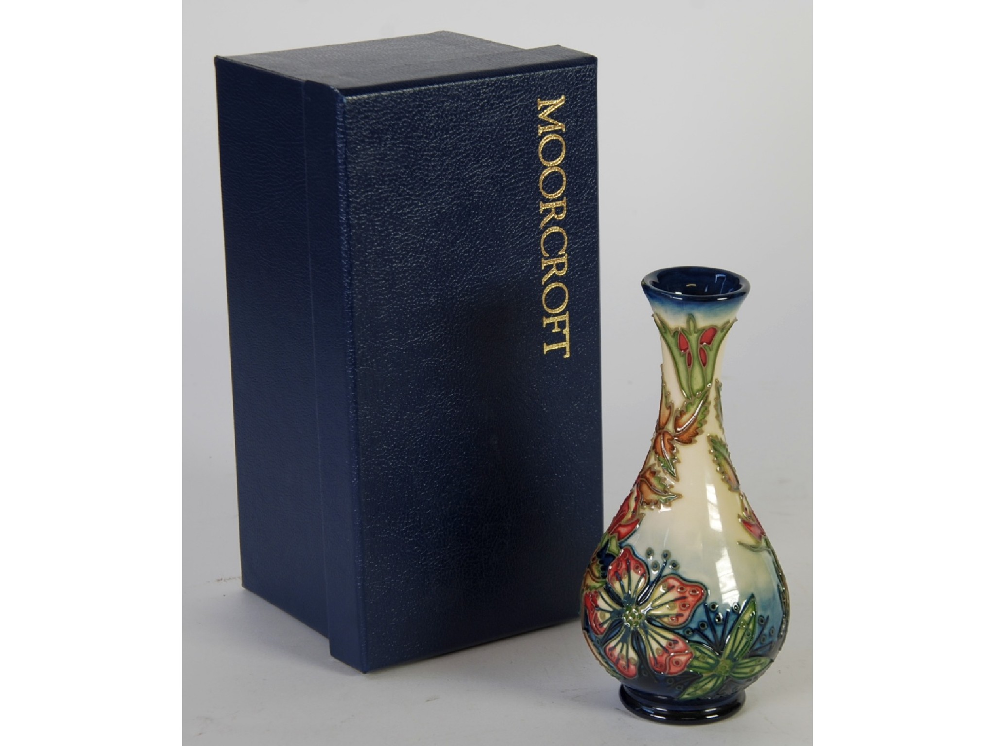 Appraisal: A MODERN MOORCROFT SWEET BRIAR PATTERN TUBE LINED POTTERY VASE