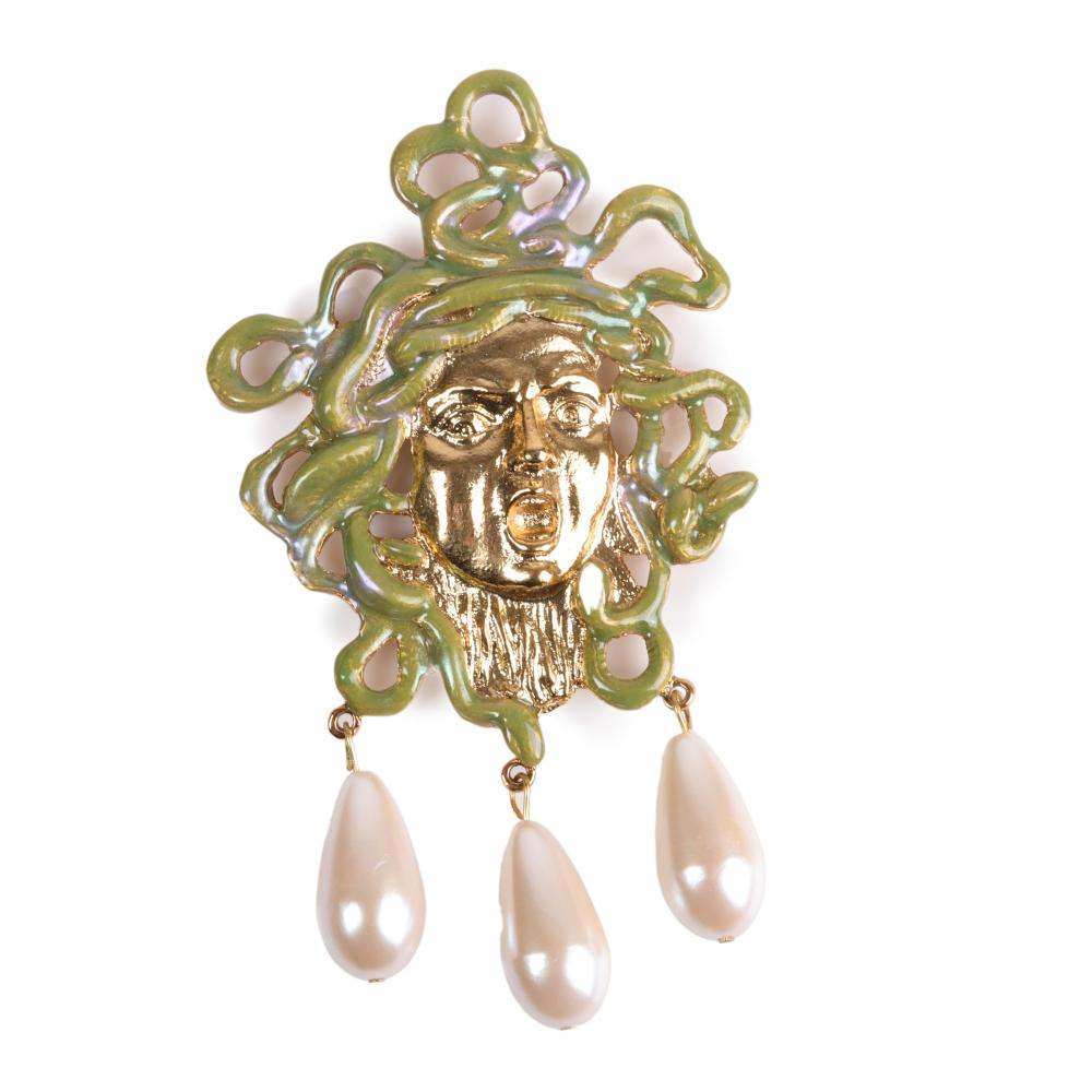 Appraisal: Large Medusa figural gold washed dress clip with green enamel