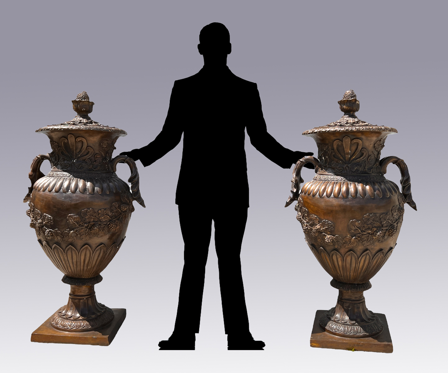 Appraisal: PAIR OF PALATIAL BRONZE GRAPEVINE LIDDED URNS Large patinated bronze