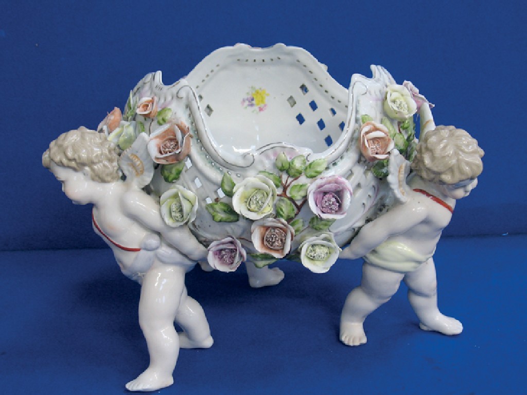 Appraisal: AN EARLY TH CENTURY MEISSEN CENTREPIECE modelled as a basket