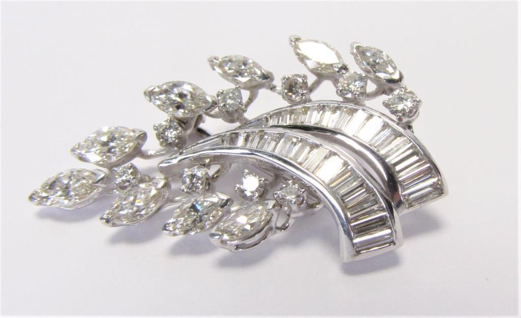 Appraisal: A vintage white gold brooch with approximately ct of marquise