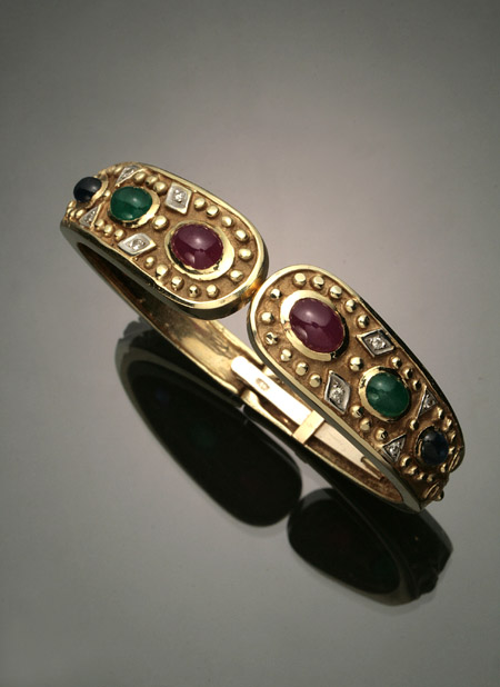 Appraisal: -Karat Yellow-Gold Diamond Blue Sapphire Ruby and Emerald Bangle Bracelet