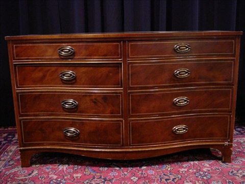 Appraisal: SHERATON STYLE MAHOGANY DOUBLE CHEST th c the serpentine front