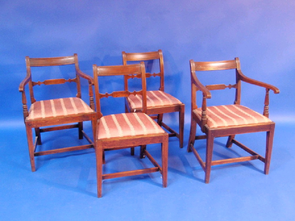 Appraisal: A set of four George III elm dining chairs including