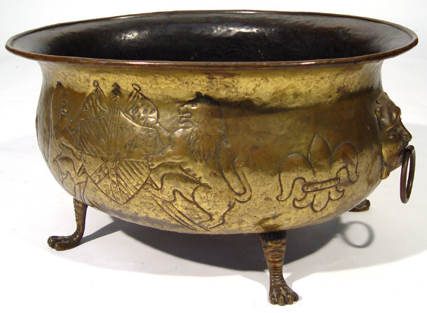 Appraisal: Oval brass log bucket embossed with panels of flowers cm