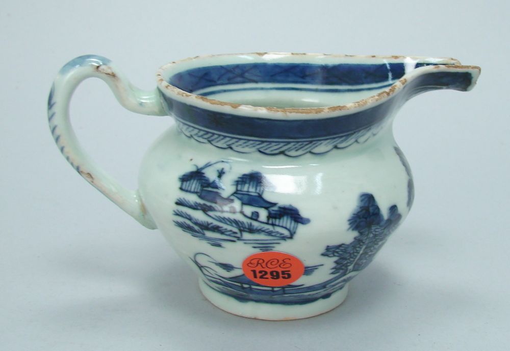 Appraisal: CHINESE EXPORT CANTON PORCELAIN CREAMER th CenturyWith blue and white