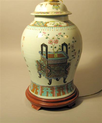 Appraisal: Chinese enamel decorated covered urn Of baluster form with a