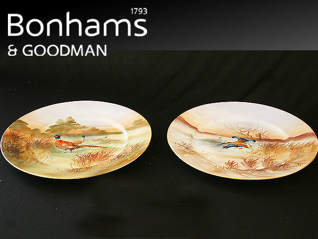 Appraisal: A pair of Stoke on Trent cabinet plates painted with