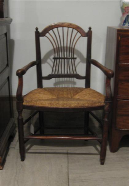 Appraisal: English provincial rush seat armchair late th early th century