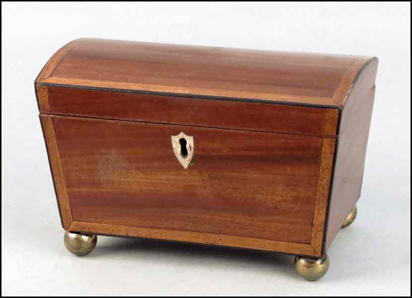 Appraisal: ENGLISH MAHOGANY TEA CADDY Raised on brass bun feet wth