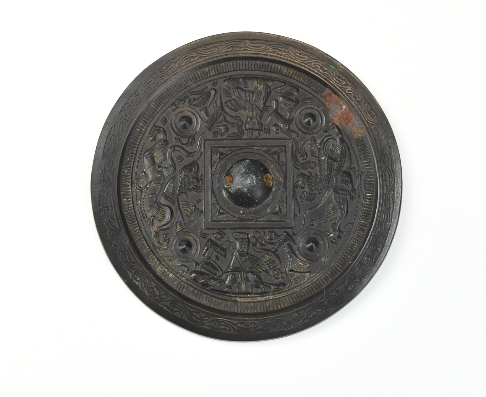 Appraisal: CHINESE CARVED BRONZE MIRROR Chinese Han style a circular bronze