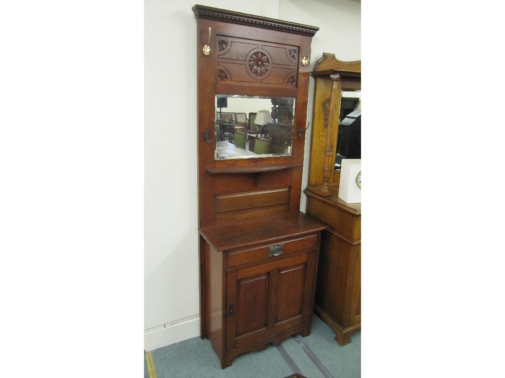 Appraisal: Oak mirrored hallstand with cupboard section