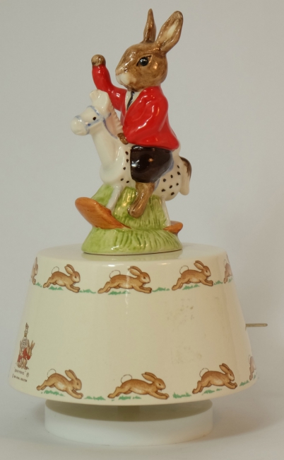 Appraisal: Royal Doulton musical figure Rock a bye baby