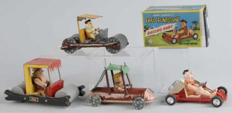 Appraisal: Lot of Flintstone Vehicle Toys Description Includes Marx Flintstone Flivver