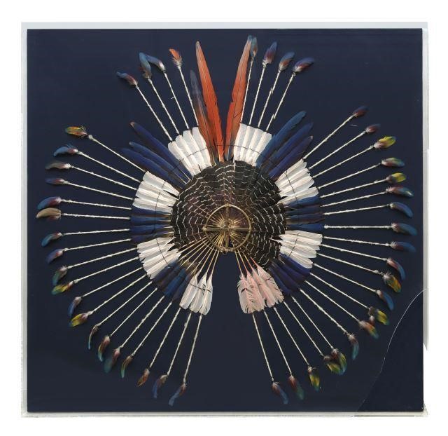 Appraisal: Brazilian framed feathered headdress Karaja peoples multi-colored feathers surrounding wood