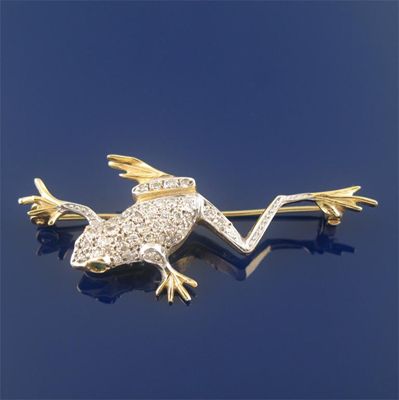 Appraisal: A modern diamond set frog brooch with cabochon emerald eyes