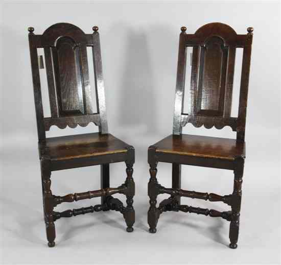 Appraisal: A pair of Queen Anne oak and fruitwood chairs with