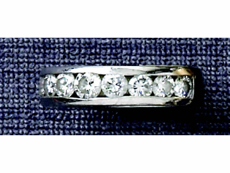 Appraisal: DIAMOND WEDDING RING k white gold channel set band with