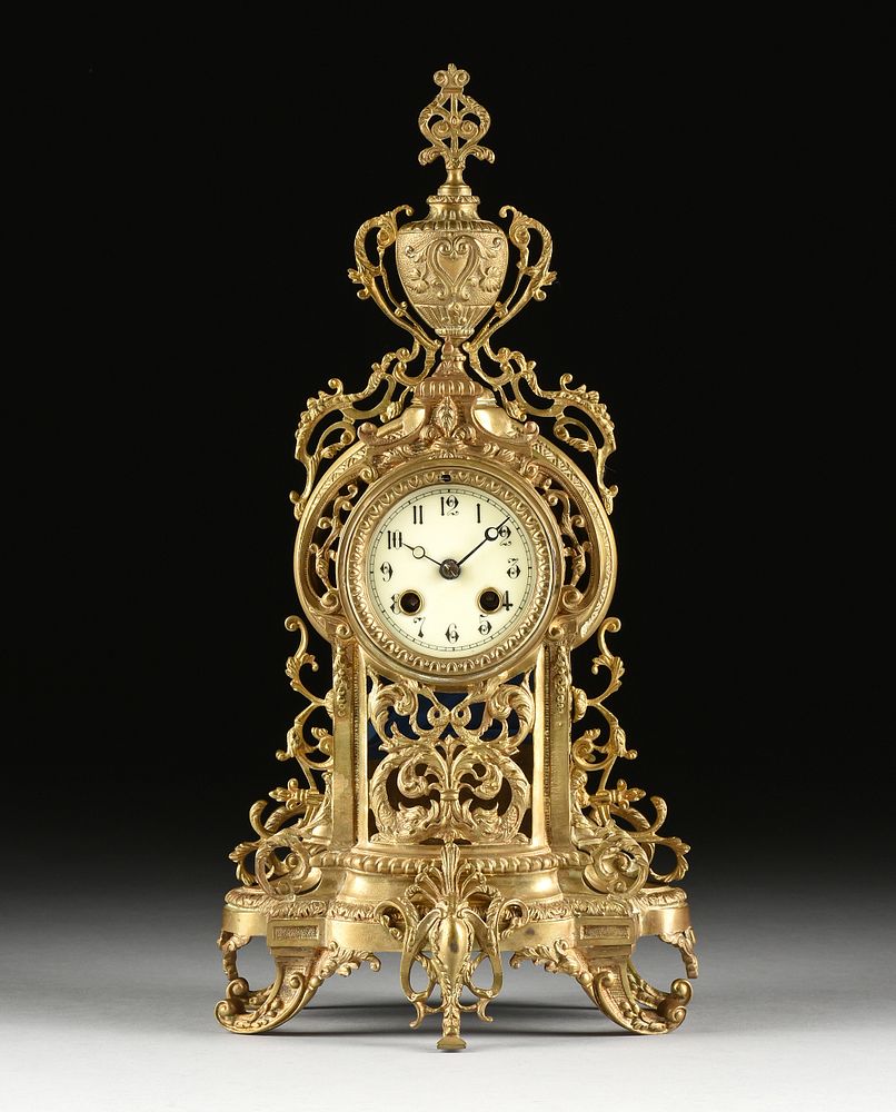 Appraisal: A BAROQUE REVIVAL GILT BRASS MANTEL CLOCK PROBABLY ENGLISH EARLY