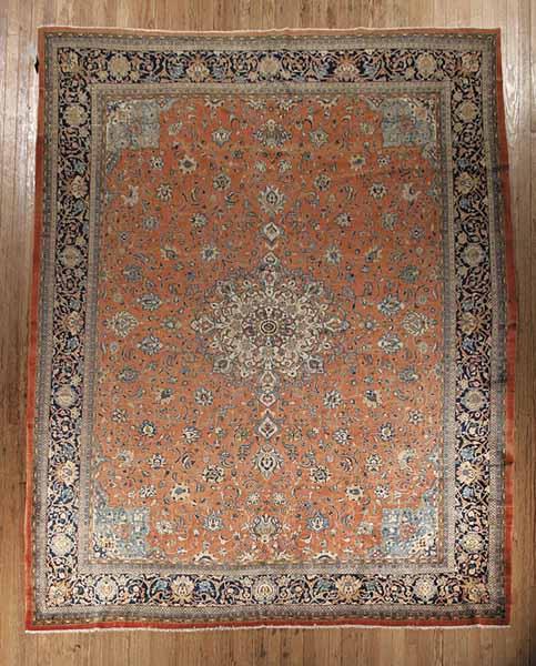 Appraisal: A Fine Persian Sarouk Carpet rust ground with central medallion