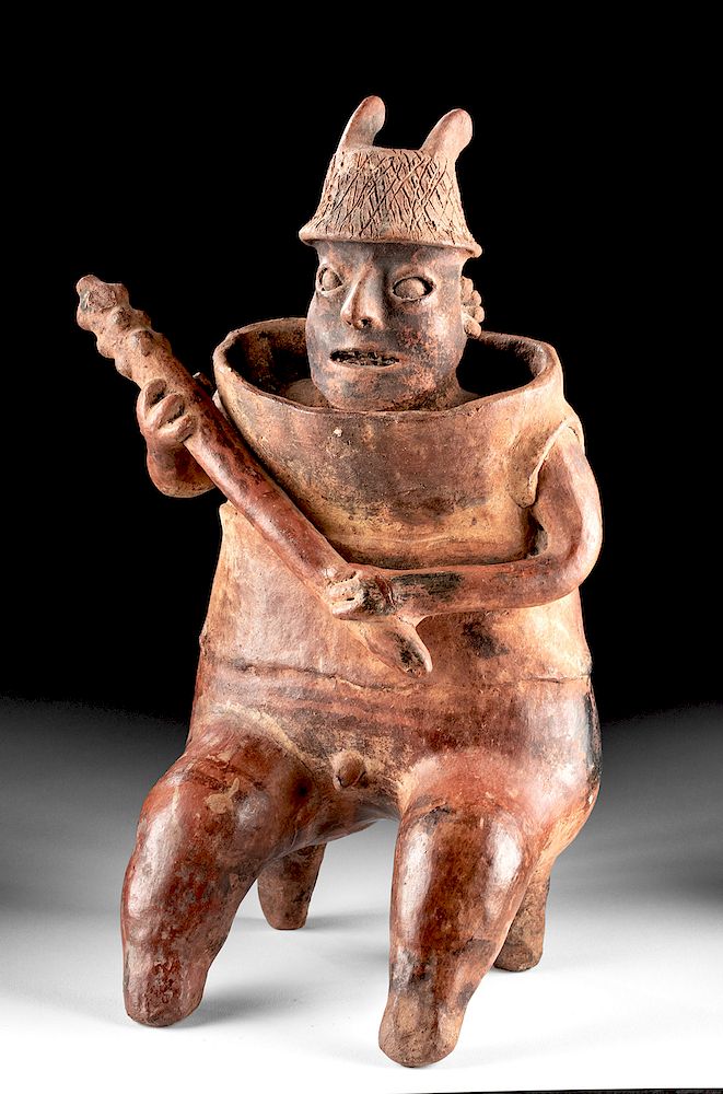 Appraisal: Nayarit Pottery Seated Male Warrior w Barrel Armor Pre-Columbian West