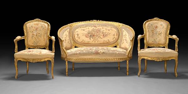 Appraisal: A Louis XVI style carved giltwood suite of seat furniture