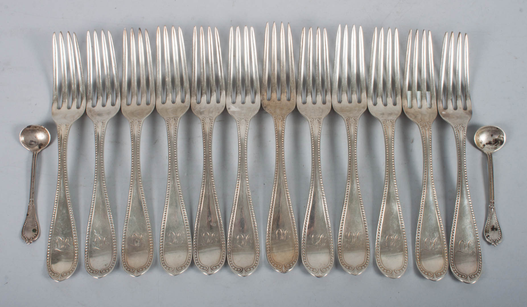 Appraisal: Twelve American coin silver dinner forks no maker's mark retailed